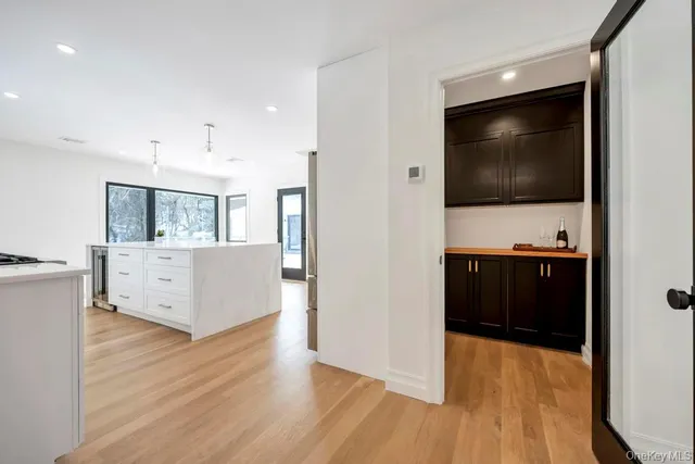 a view of kitchen with wooden floor