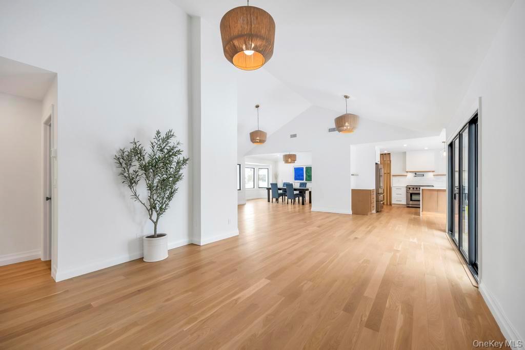 10 Lenape Road Southampton, NY 11968 - Photo 7 of 37 a view of a livingroom with furniture wooden floor and a rug