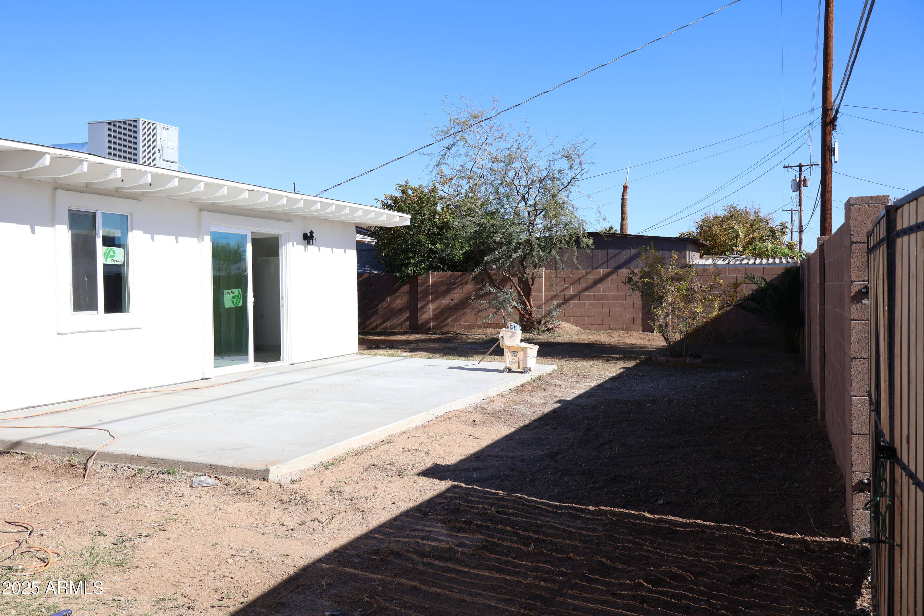 4251 West Rose Lane Phoenix, AZ 85019 - Photo 19 of 24 a view of a backyard of the house