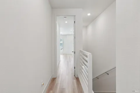 a bathroom with a shower and a sink