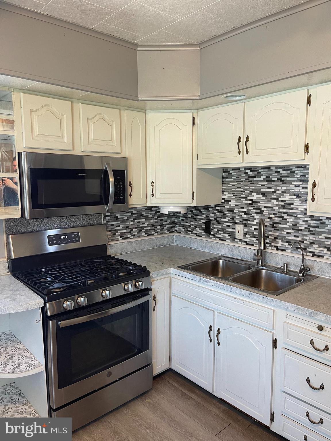 1707 Drexel Road Dundalk, MD 21222 - Photo 6 of 21 The cabinets have been recently painted,
