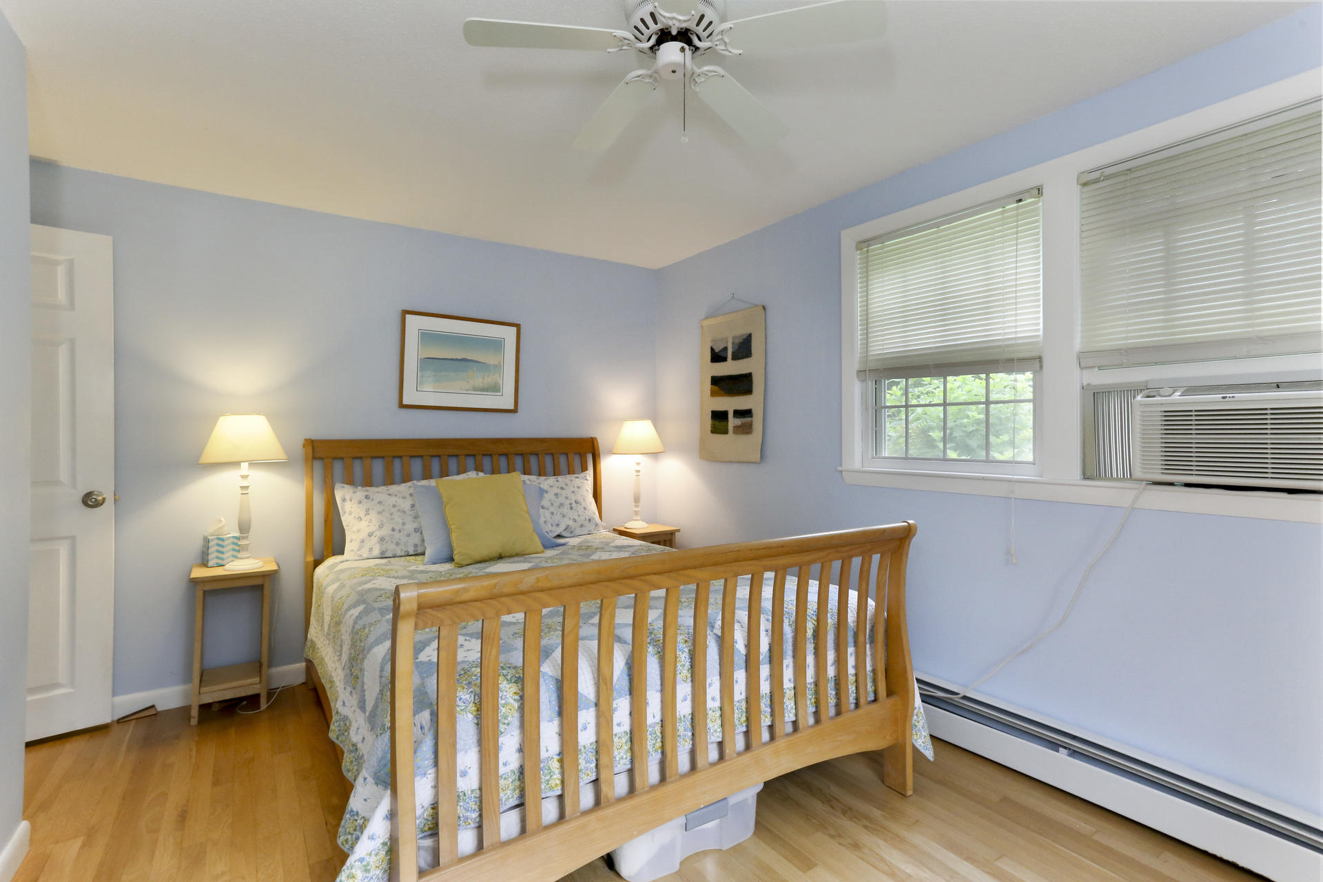 645 Scraggy Neck Road Cataumet, MA 02534 - Photo 17 of 32 a bedroom with a bed and a window