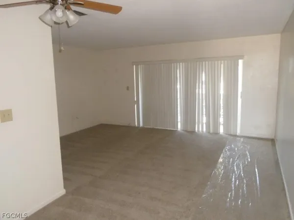 en empty room with windows