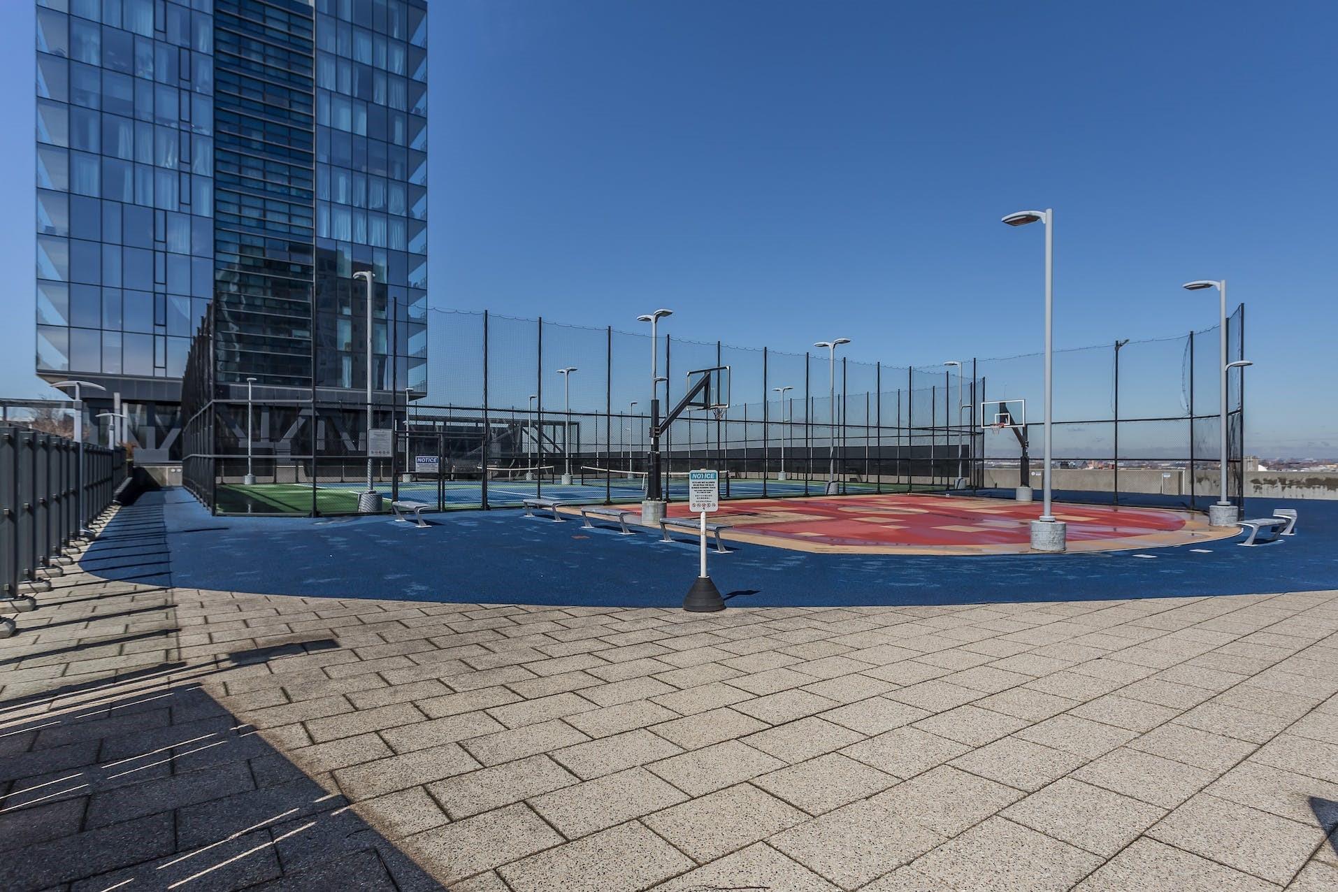 131-01 40 Road, Unit 11N Queens, NY 11354 - Photo 18 of 18 View of home's community with community basketball court