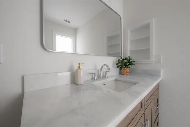 a bathroom with a shower curtain