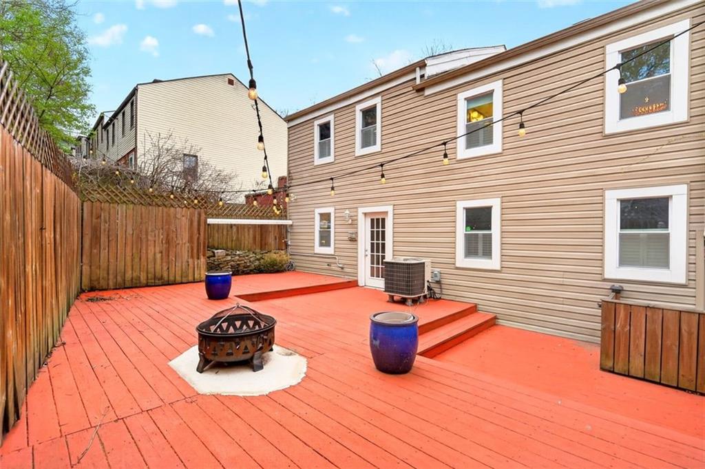 25 Greeley Street Pittsburgh, PA 15203 - Photo 21 of 49 Rear Deck with Privacy Fence off Kitchen