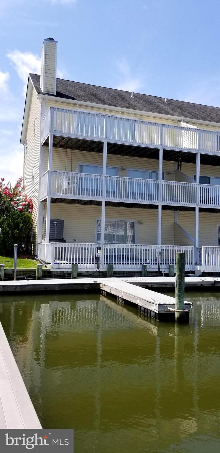 36 Cove Road, Unit 36 Ocean View, DE 19970 - Photo 1 of 25 End town home w/ deeded boat slip at your door