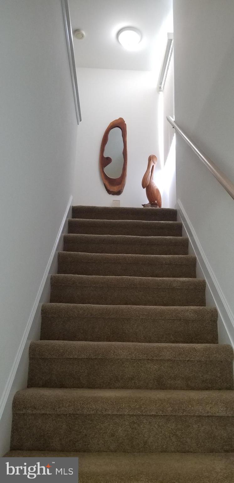 36 Cove Road, Unit 36 Ocean View, DE 19970 - Photo 15 of 25 Stairs to bedrooms