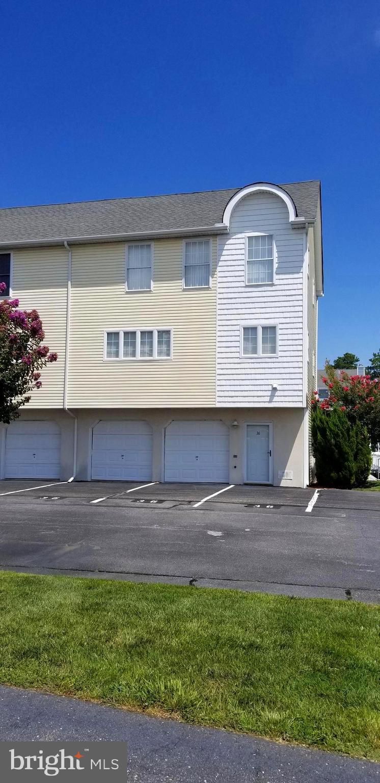 36 Cove Road, Unit 36 Ocean View, DE 19970 - Photo 3 of 25 Street view with 2 bay garage, 3 parking spaces