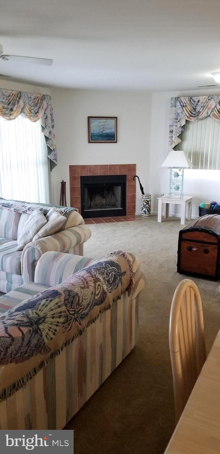 36 Cove Road, Unit 36 Ocean View, DE 19970 - Photo 8 of 25 Great room with wood burning fireplace
