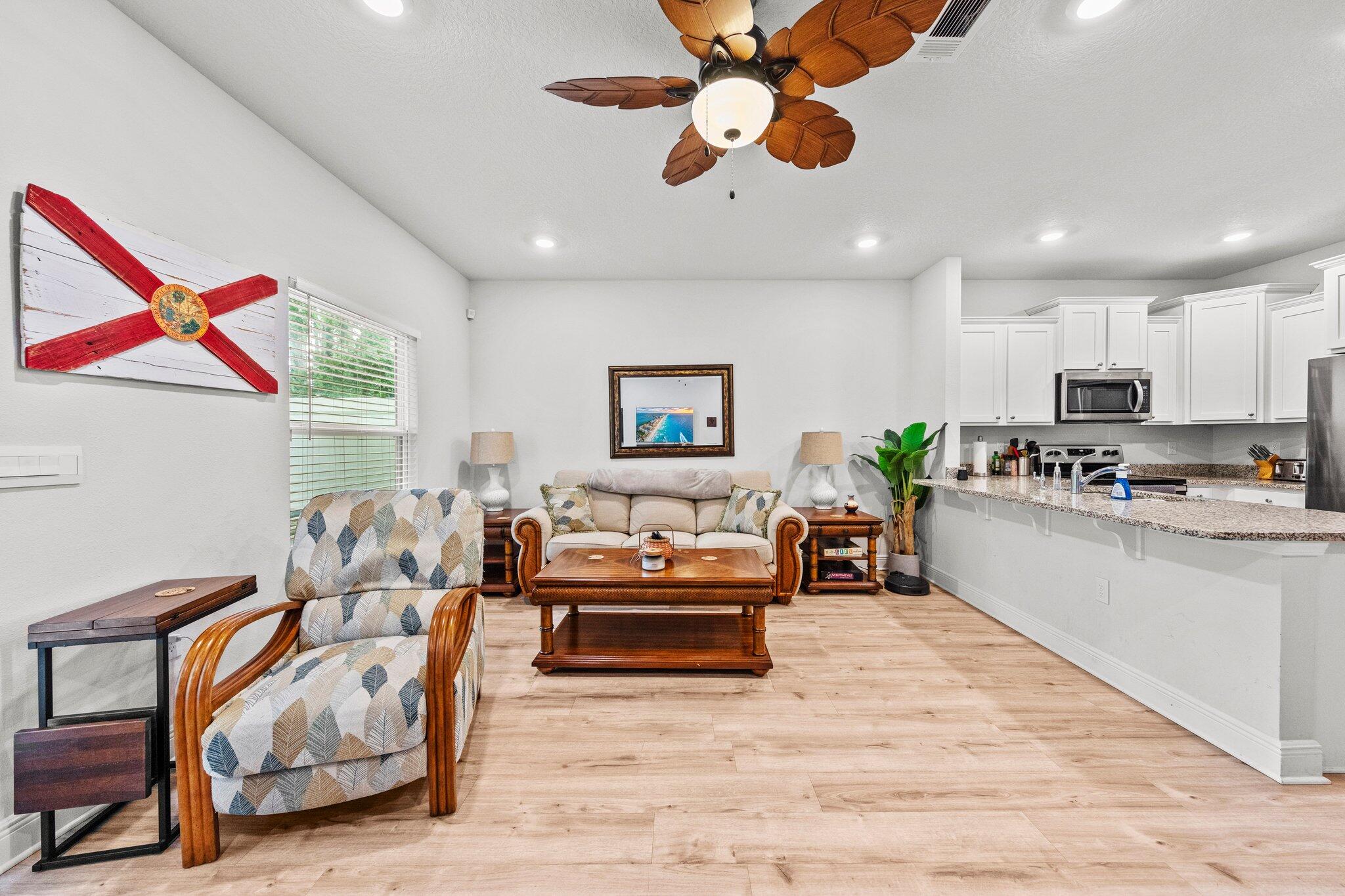 8 Sandy Cv Way Miramar Beach, FL 32550 - Photo 16 of 50 a living room with furniture and kitchen view