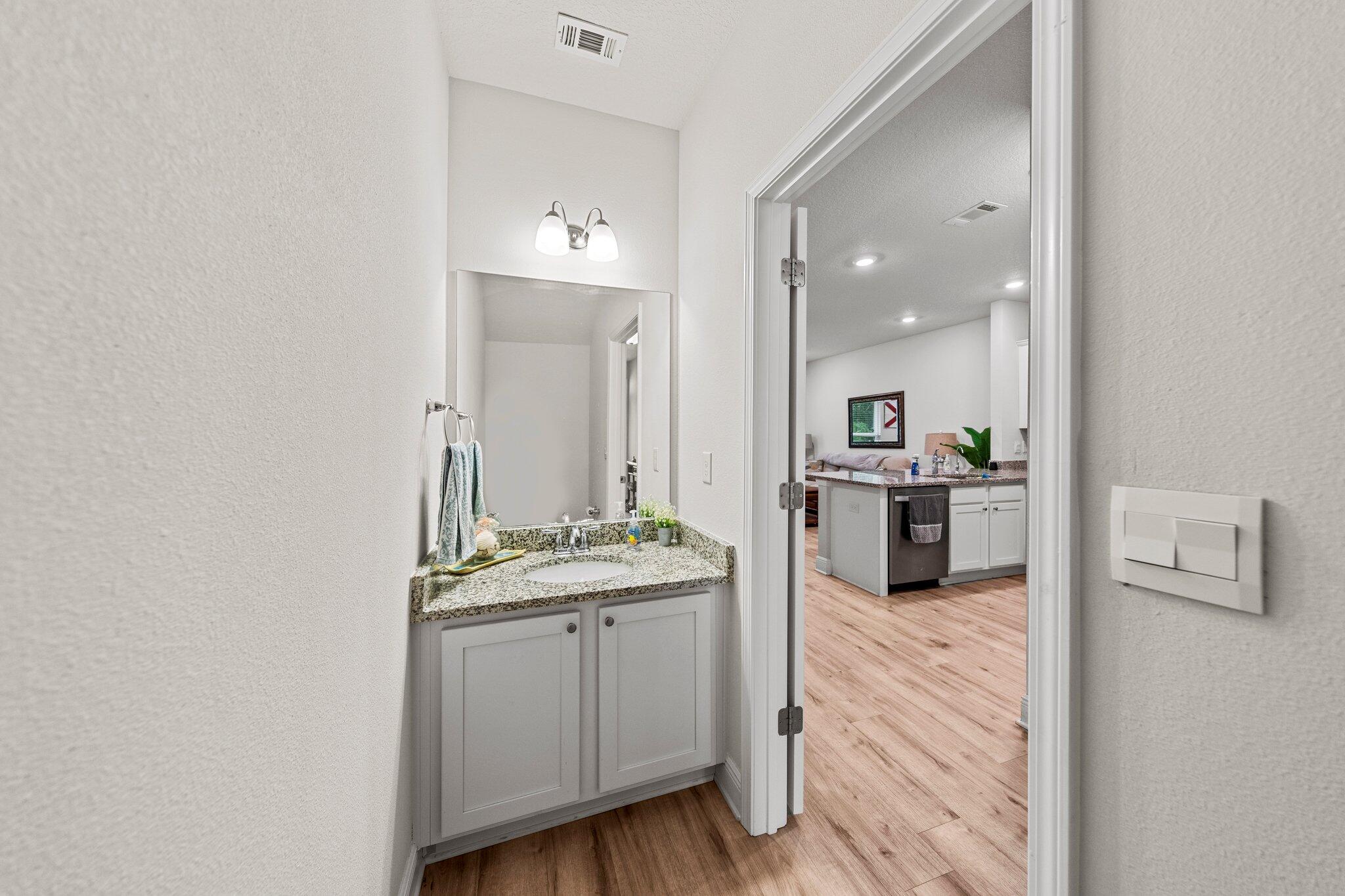 8 Sandy Cv Way Miramar Beach, FL 32550 - Photo 21 of 50 a bathroom with a sink a mirror and a bathtub