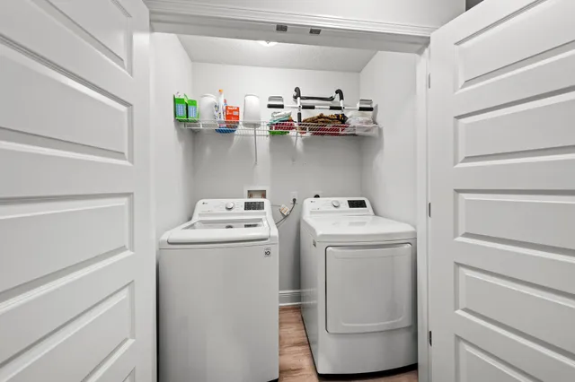 a utility room with dryer and washer