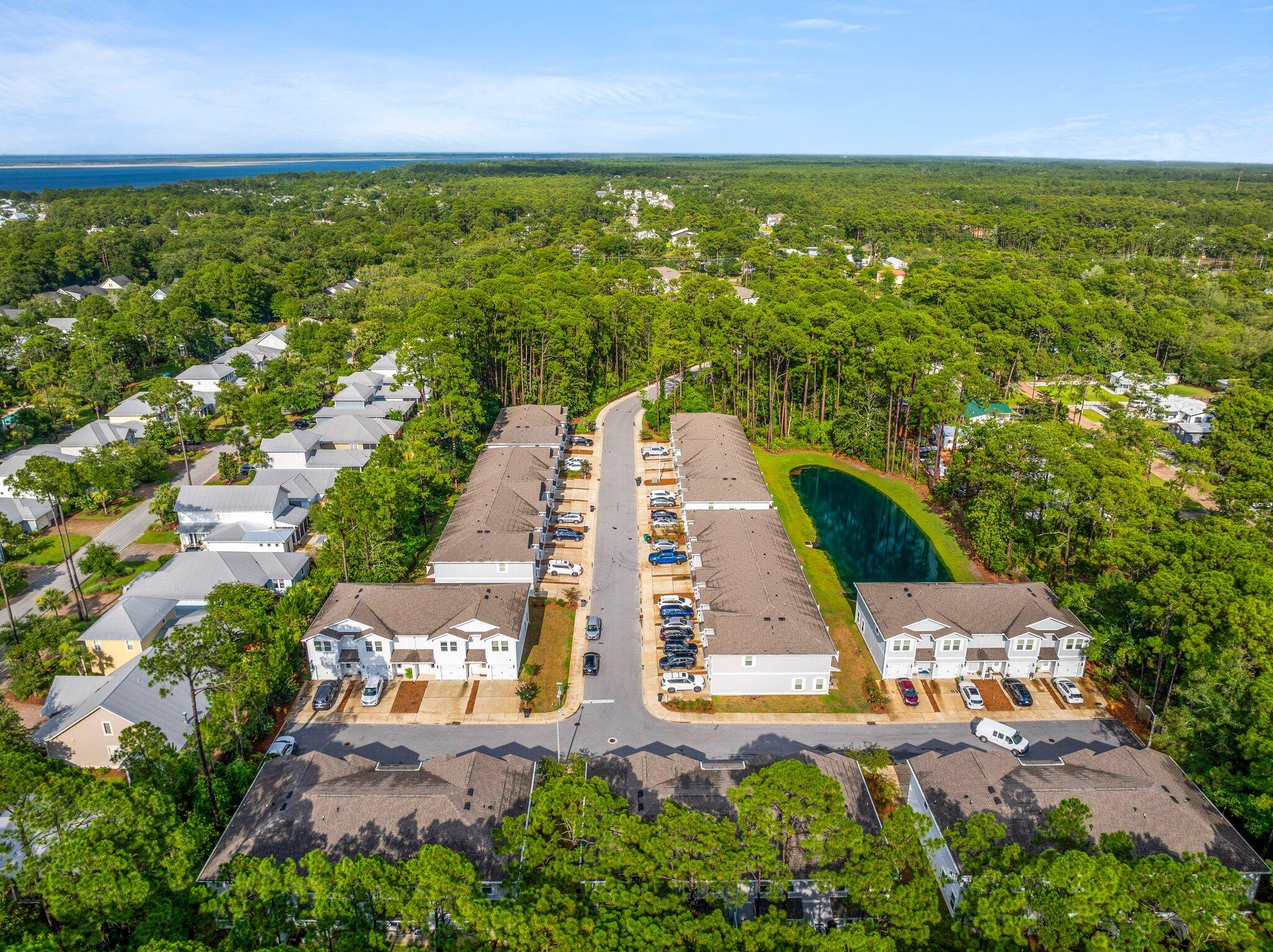 8 Sandy Cv Way Miramar Beach, FL 32550 - Photo 43 of 50 an aerial view of residential houses with outdoor space and swimming pool