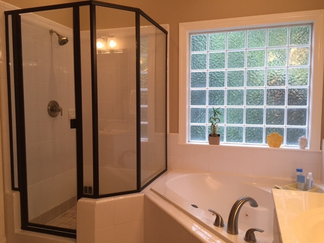 8004 Millenium Drive Raleigh, NC 27614 - Photo 17 of 24 Separate shower and garden tub in the master bathroom. Master Bath/Spa