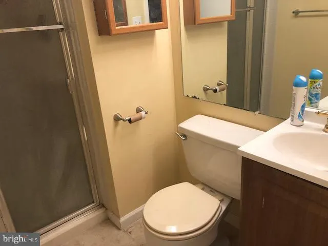 a bathroom with a sink and toilet