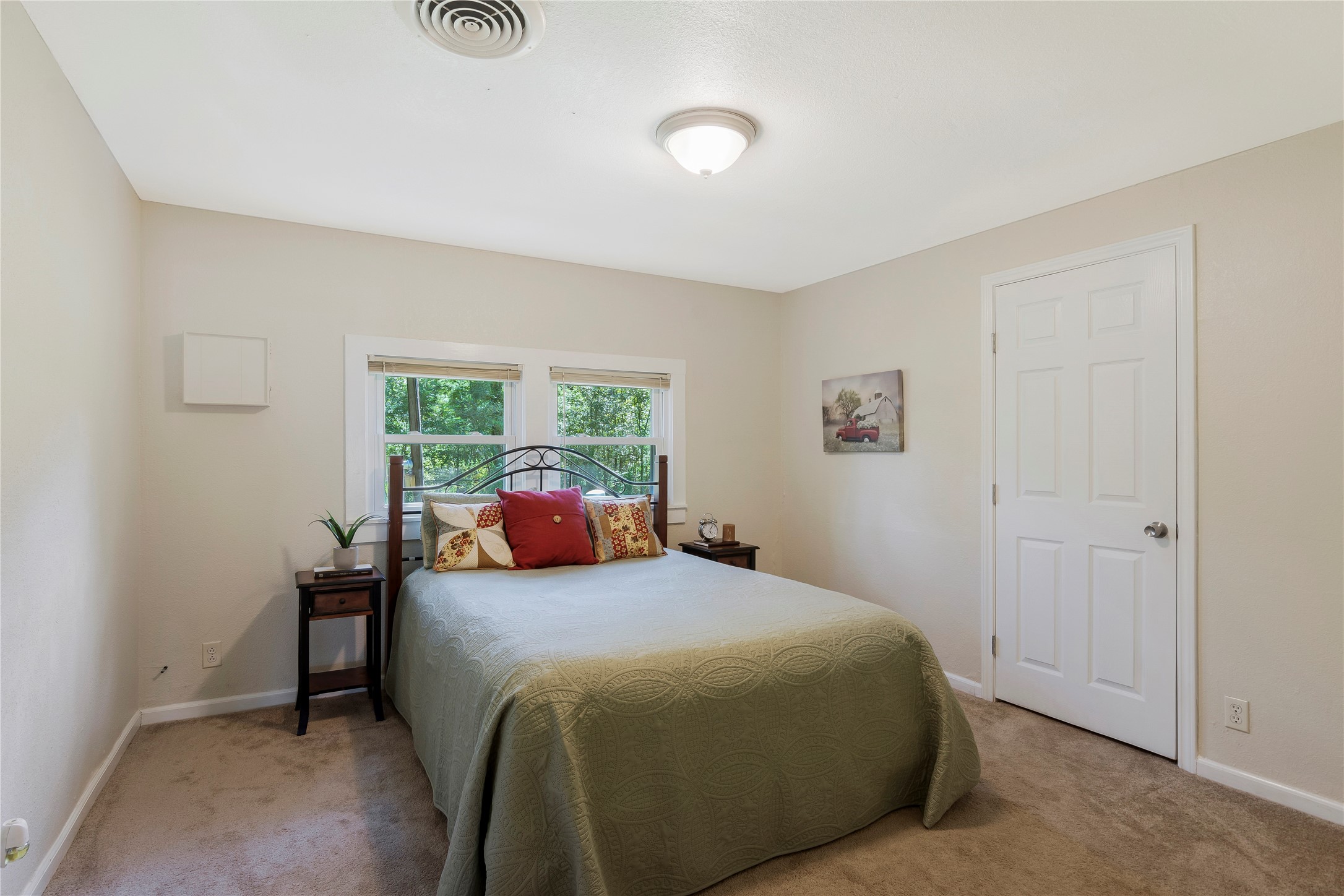 15552 Schank Road Conroe, TX 77306 - Photo 21 of 50 a bedroom with a bed and a window