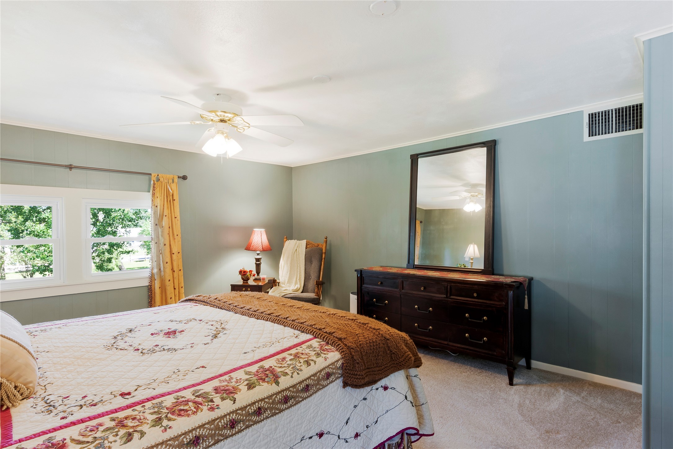 15552 Schank Road Conroe, TX 77306 - Photo 28 of 50 a bedroom with a bed and a dresser