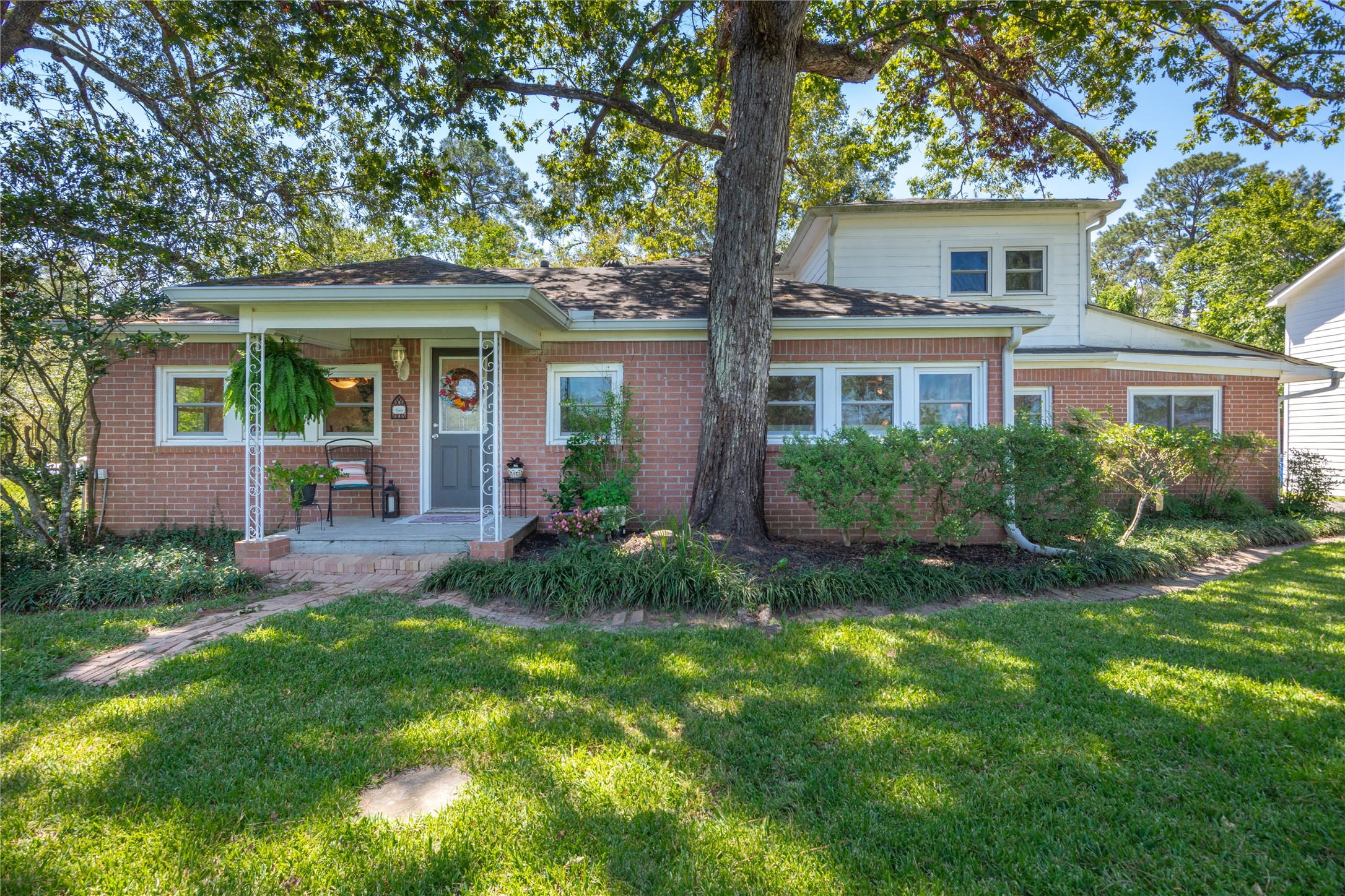 15552 Schank Road Conroe, TX 77306 - Photo 5 of 50 front view of a house with a yard