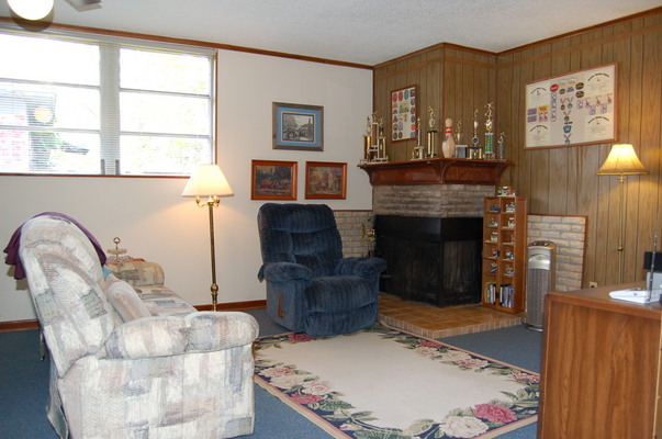 1920 Ector Road Jacksonville, FL 32211 - Photo 12 of 23 a living room with furniture and a fireplace