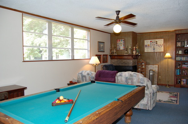 1920 Ector Road Jacksonville, FL 32211 - Photo 14 of 23 a living room with a bed furniture and a large window