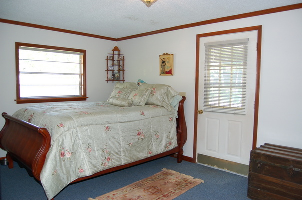 1920 Ector Road Jacksonville, FL 32211 - Photo 17 of 23 a bedroom with a bed and a window