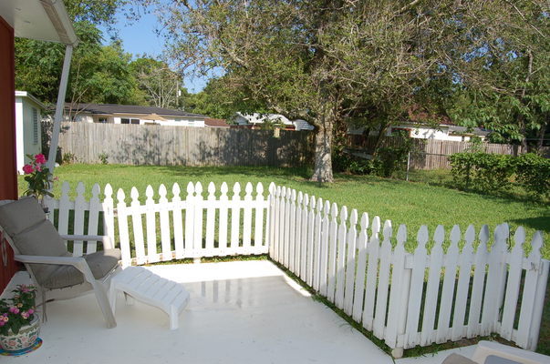 1920 Ector Road Jacksonville, FL 32211 - Photo 19 of 23 a view of a bench in the backyard