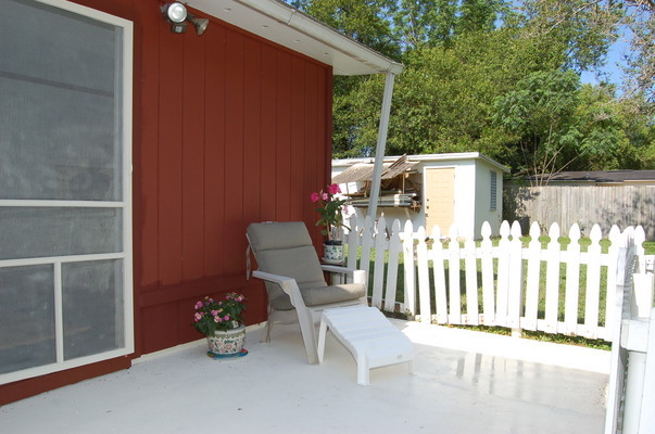 1920 Ector Road Jacksonville, FL 32211 - Photo 20 of 23 a backyard of a house with table and chairs