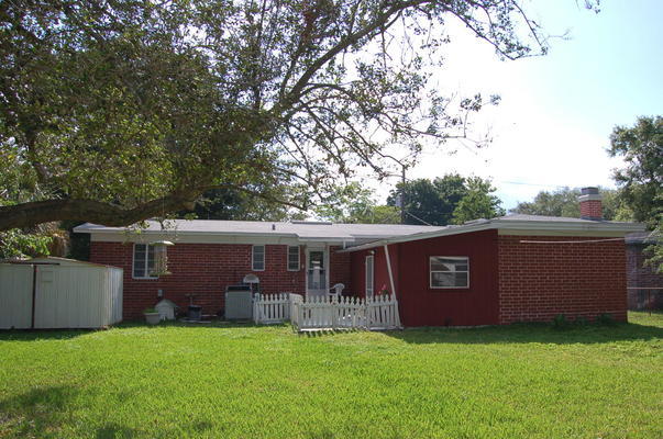 1920 Ector Road Jacksonville, FL 32211 - Photo 23 of 23 a view of a house with a yard and a tree