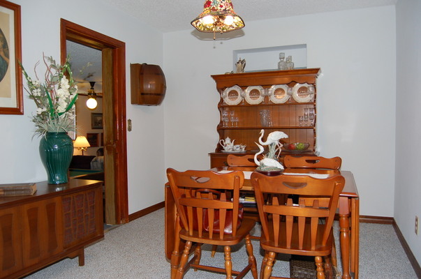 1920 Ector Road Jacksonville, FL 32211 - Photo 5 of 23 a view of a dining room with furniture and wooden floor