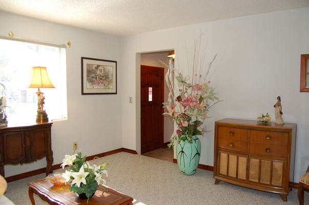 1920 Ector Road Jacksonville, FL 32211 - Photo 6 of 23 a living room with furniture and flowers