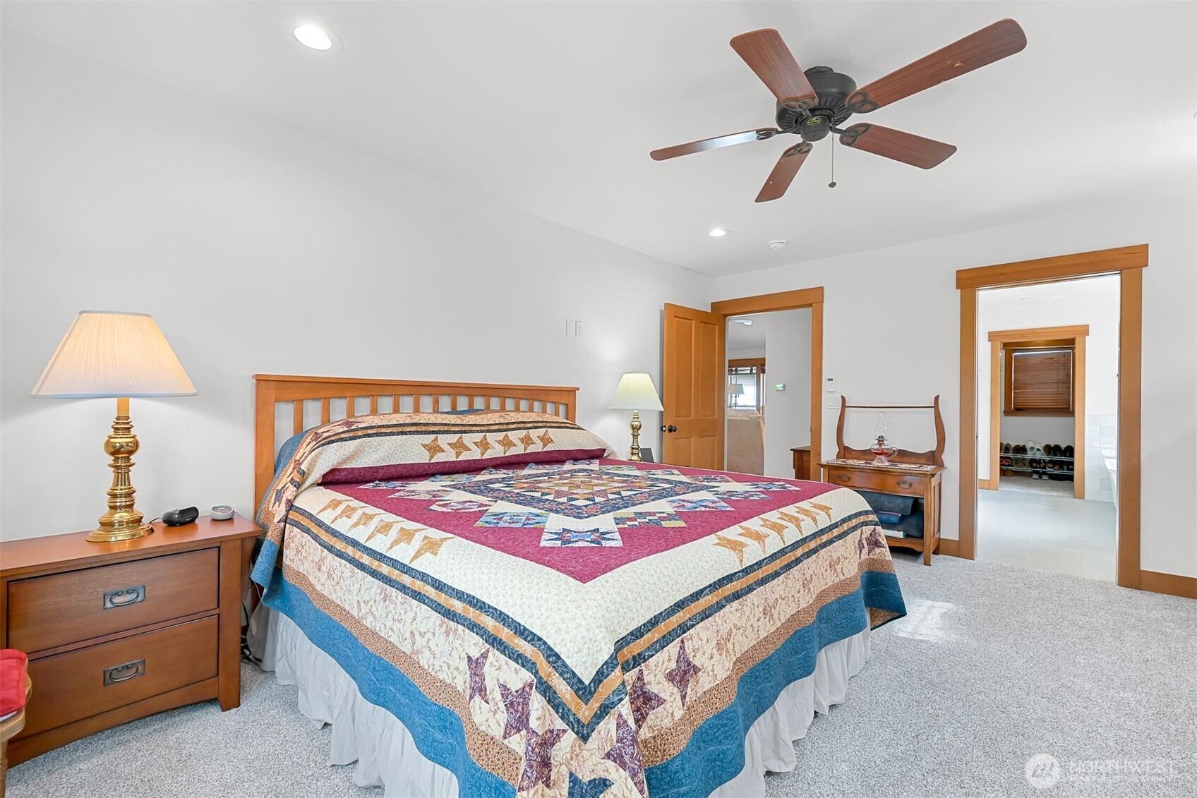 502 Westview Place Nooksack, WA 98276 - Photo 13 of 30 a bedroom with a bed and a chandelier
