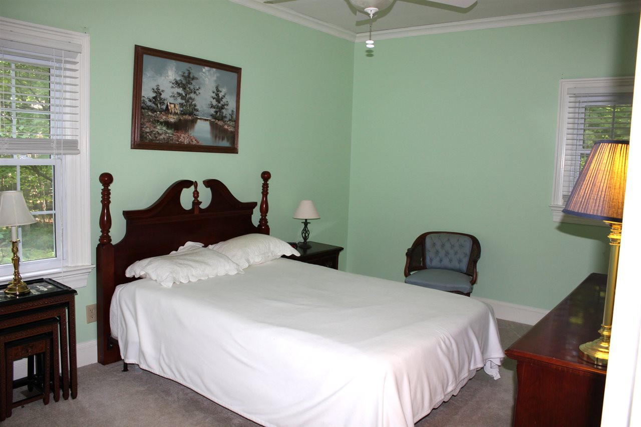9401 Does Run Court Raleigh, NC 27613 - Photo 12 of 25 1st Floor Bedroom with Full Bath Adjacent