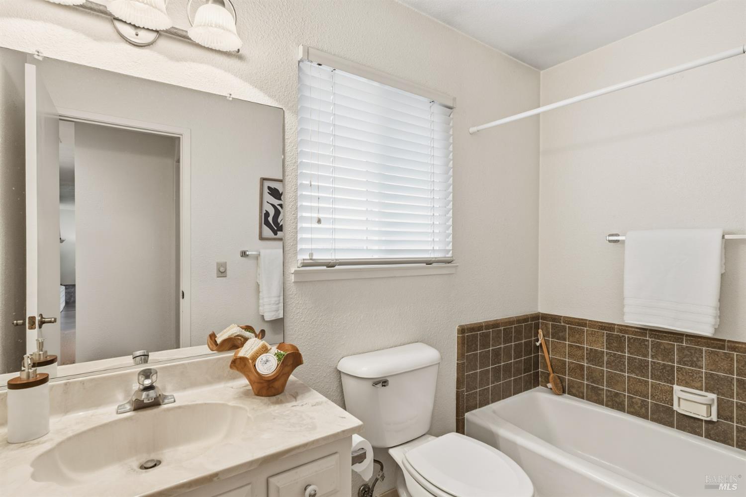 1808 Sherwood Court Santa Rosa, CA 95405 - Photo 24 of 30 a bathroom with a sink toilet and shower