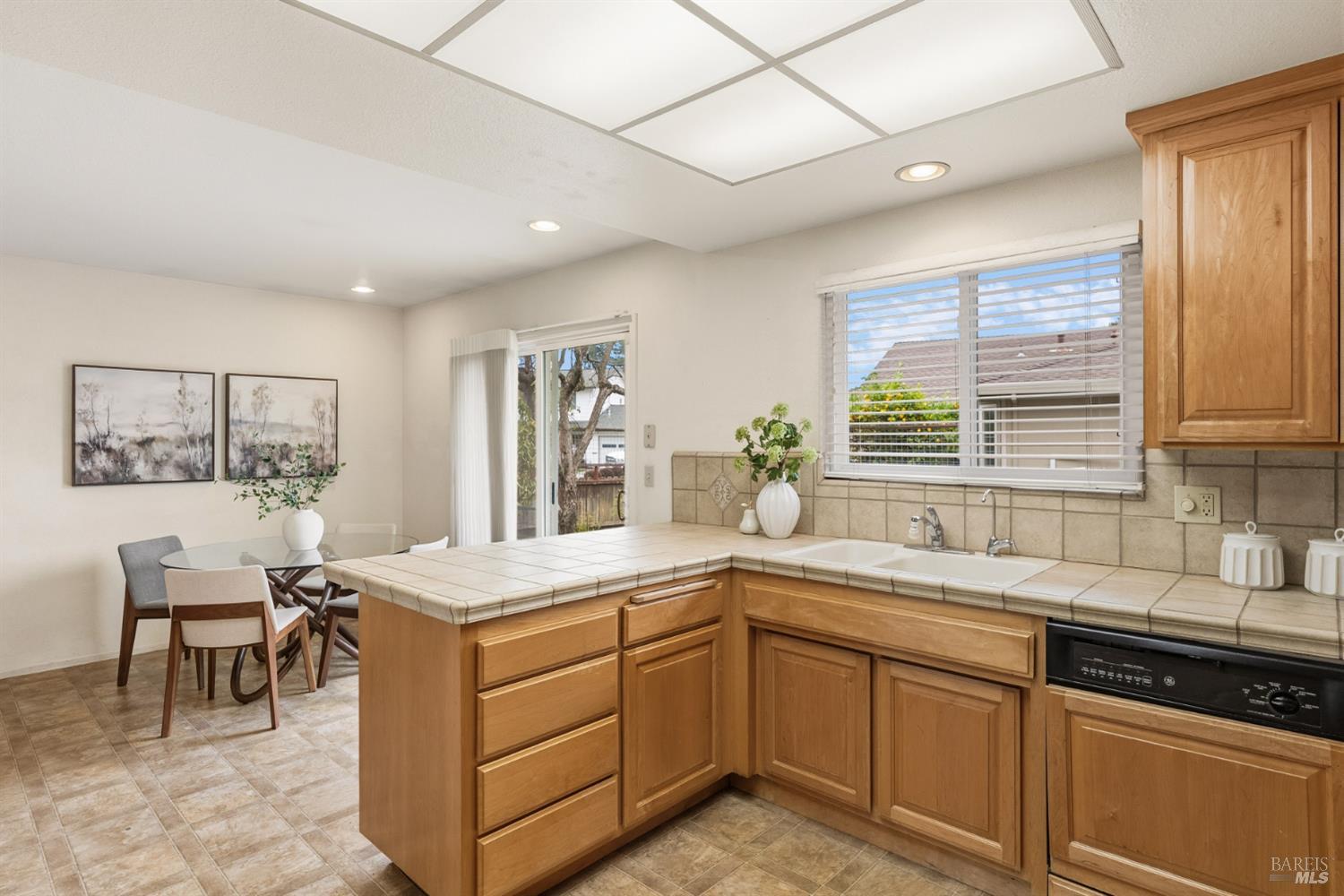 1808 Sherwood Court Santa Rosa, CA 95405 - Photo 10 of 30 a kitchen with a sink stove and cabinets