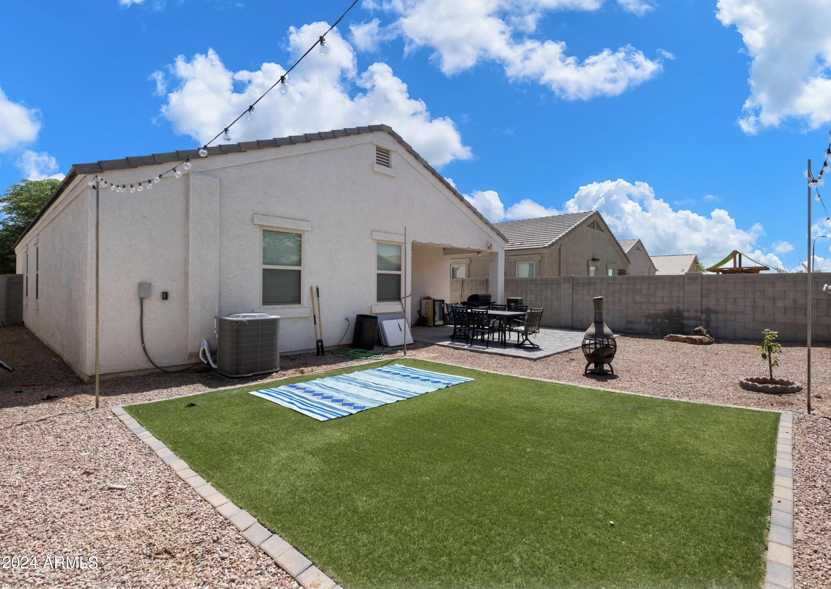 2630 West Gaby Road Phoenix, AZ 85041 - Photo 6 of 8 Backyard Turf
