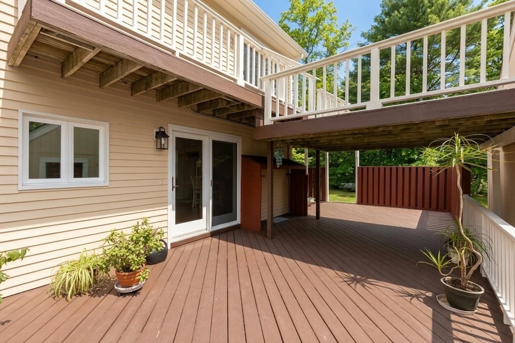 17 Weaver Street Wareham, MA 02576 - Photo 4 of 37 a view of a house with a deck