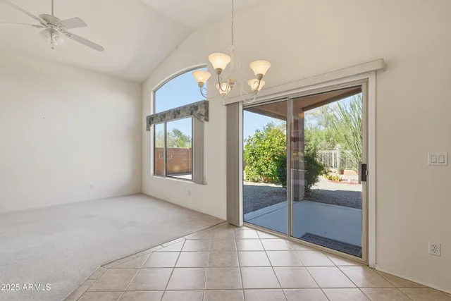 a view of a room with a large window