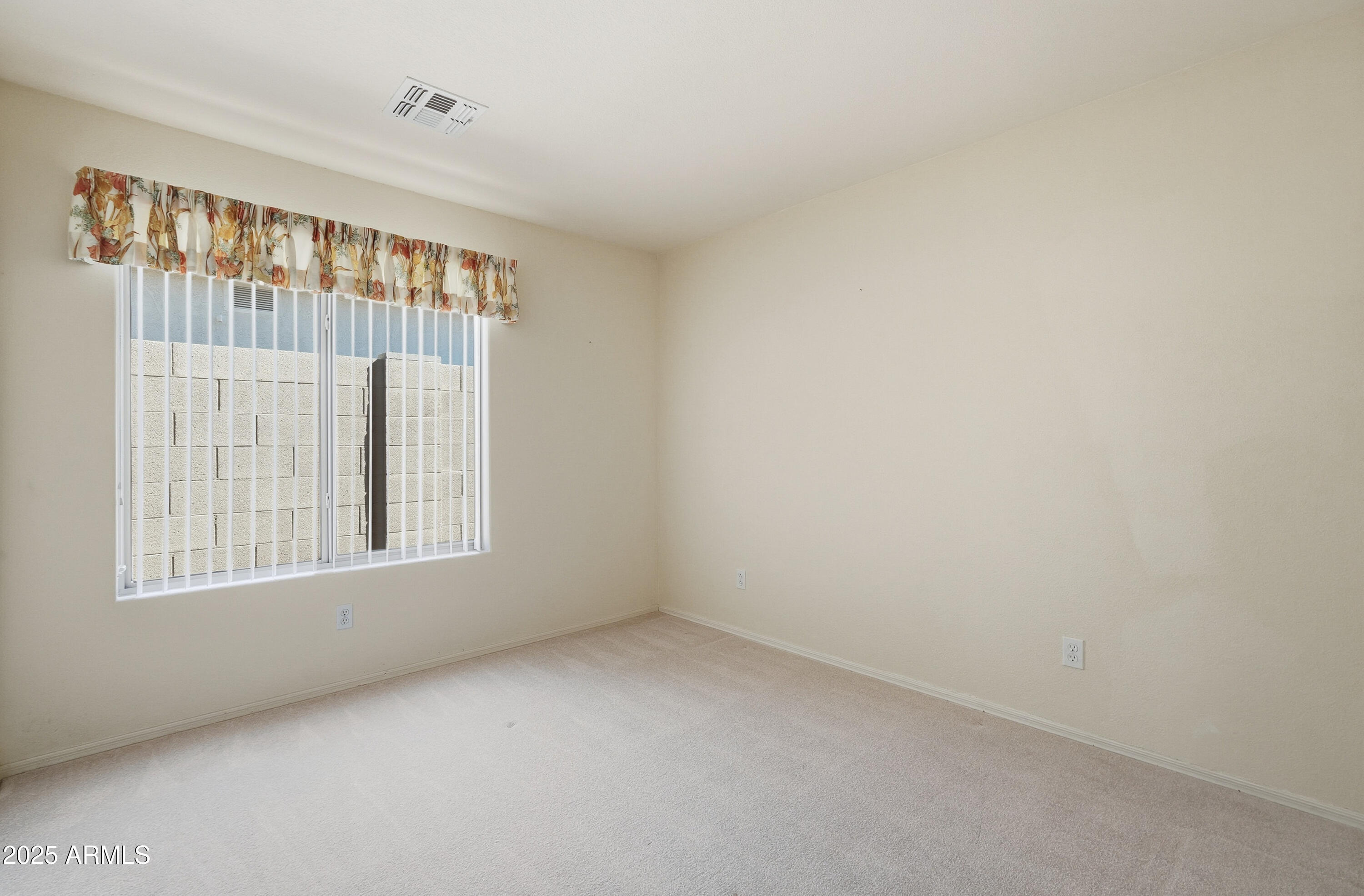 4626 East Thorn Tree Drive Cave Creek, AZ 85331 - Photo 20 of 30 a view of an empty room with a window