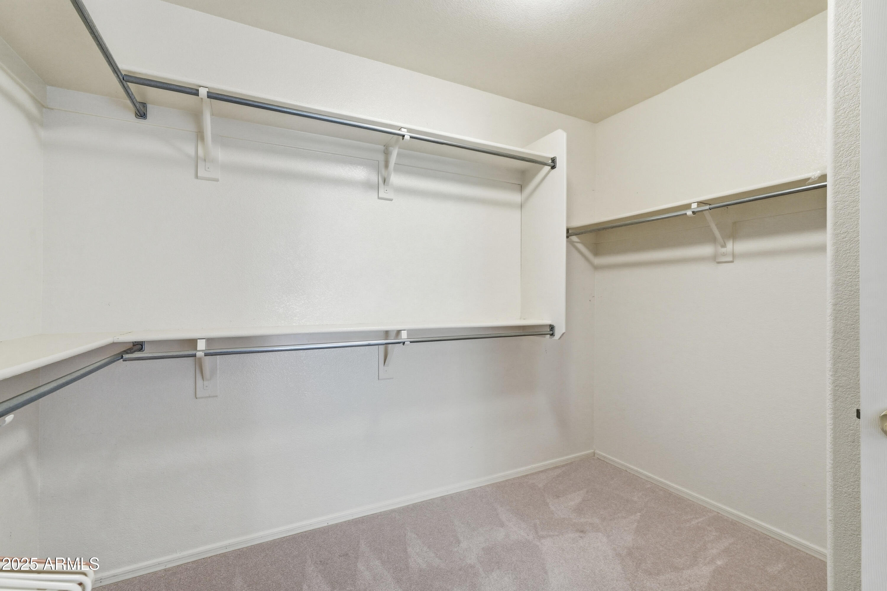 4626 East Thorn Tree Drive Cave Creek, AZ 85331 - Photo 22 of 30 a view of a room with racks on the wall