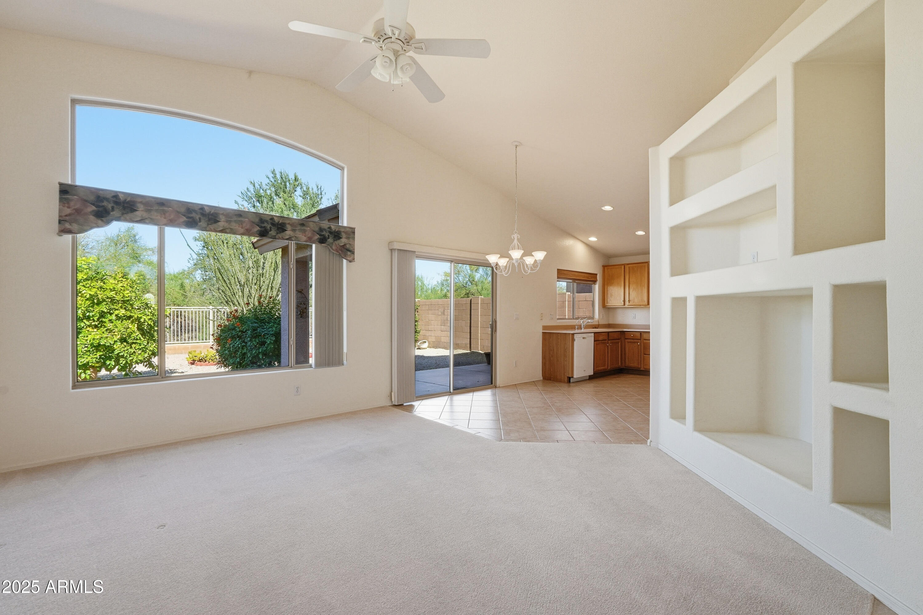 4626 East Thorn Tree Drive Cave Creek, AZ 85331 - Photo 5 of 30 a view of a big room with windows and chandelier
