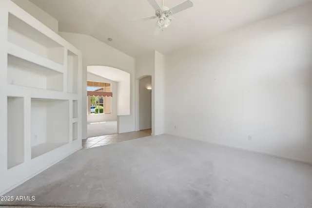 a view of a kitchen with a sink and a stove top oven