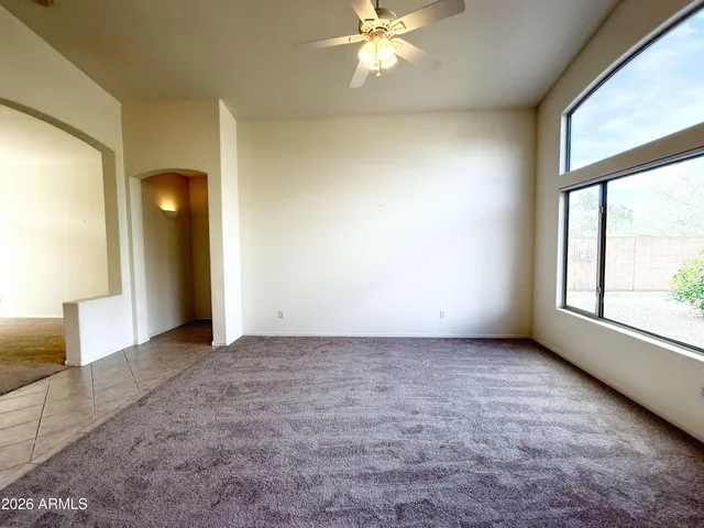 a view of a hallway with a chandelier