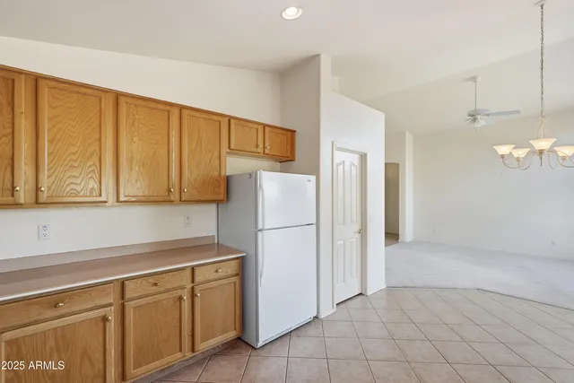a kitchen with a sink and large window