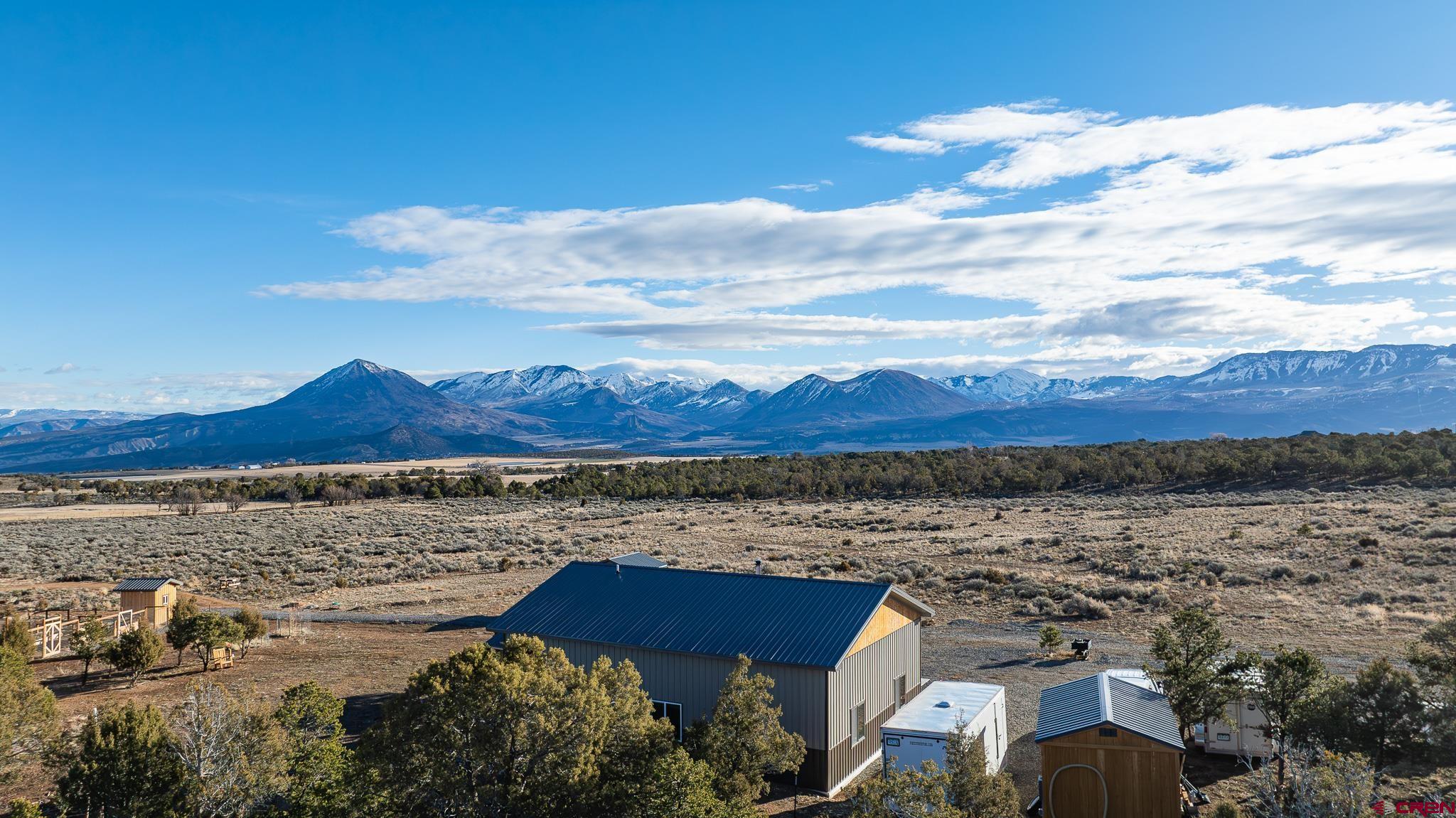 a view of a lake with sunset