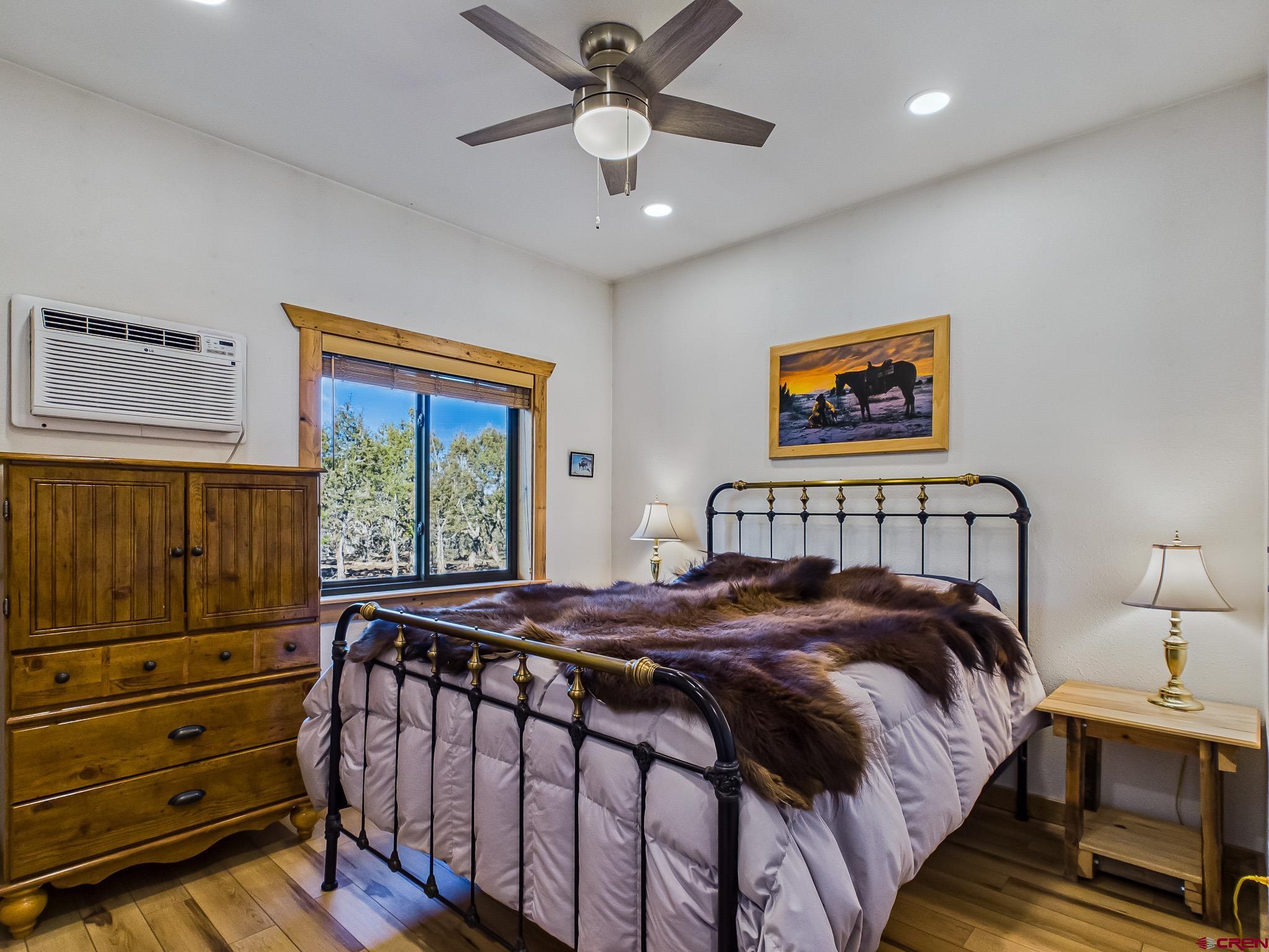 75707 B76 Road Crawford, CO 81415 - Photo 18 of 45 a bedroom with a bed and a window