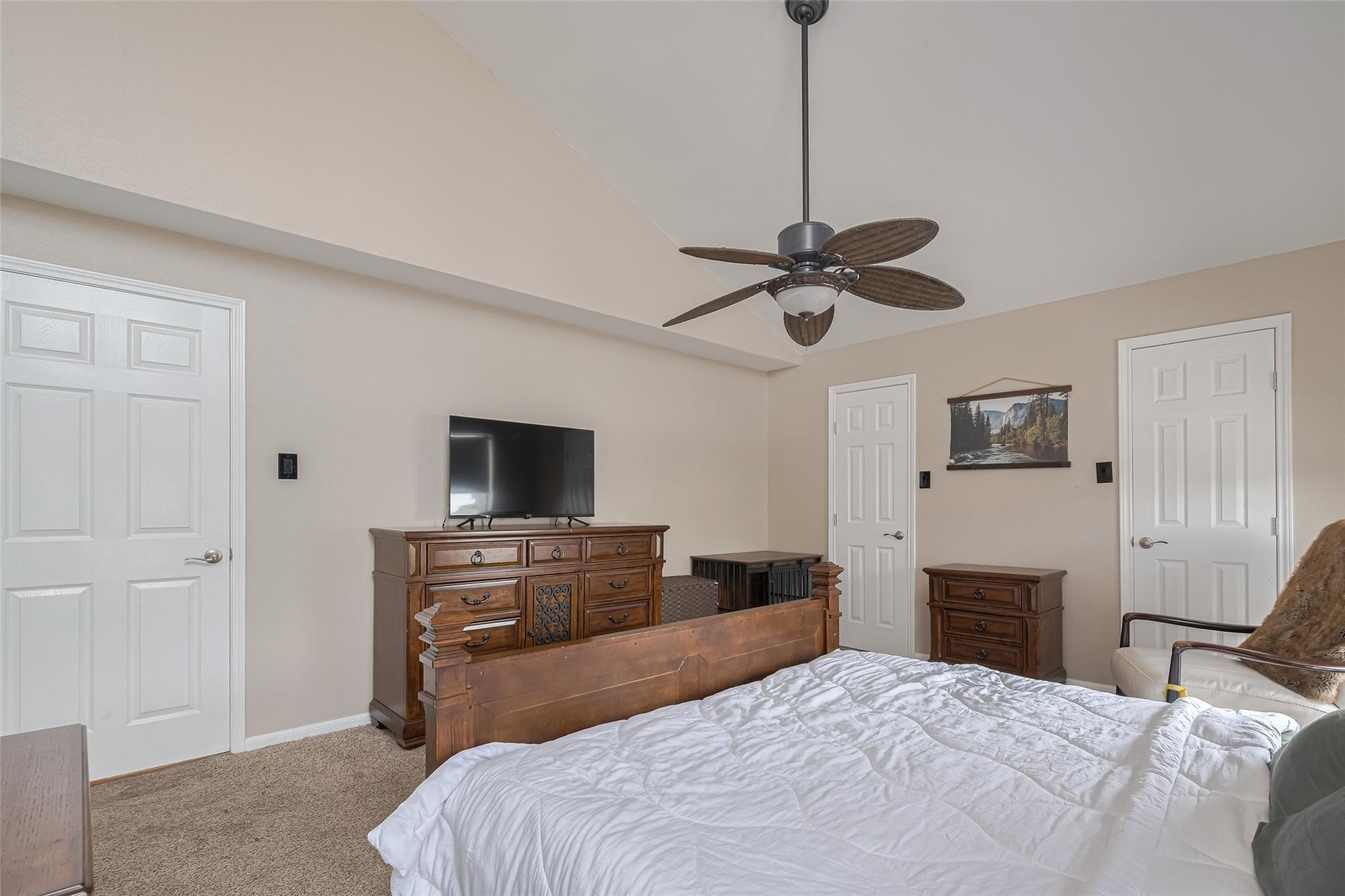 182 April Point Drive North Conroe, TX 77356 - Photo 8 of 17 a bedroom with a bed and a flat screen tv