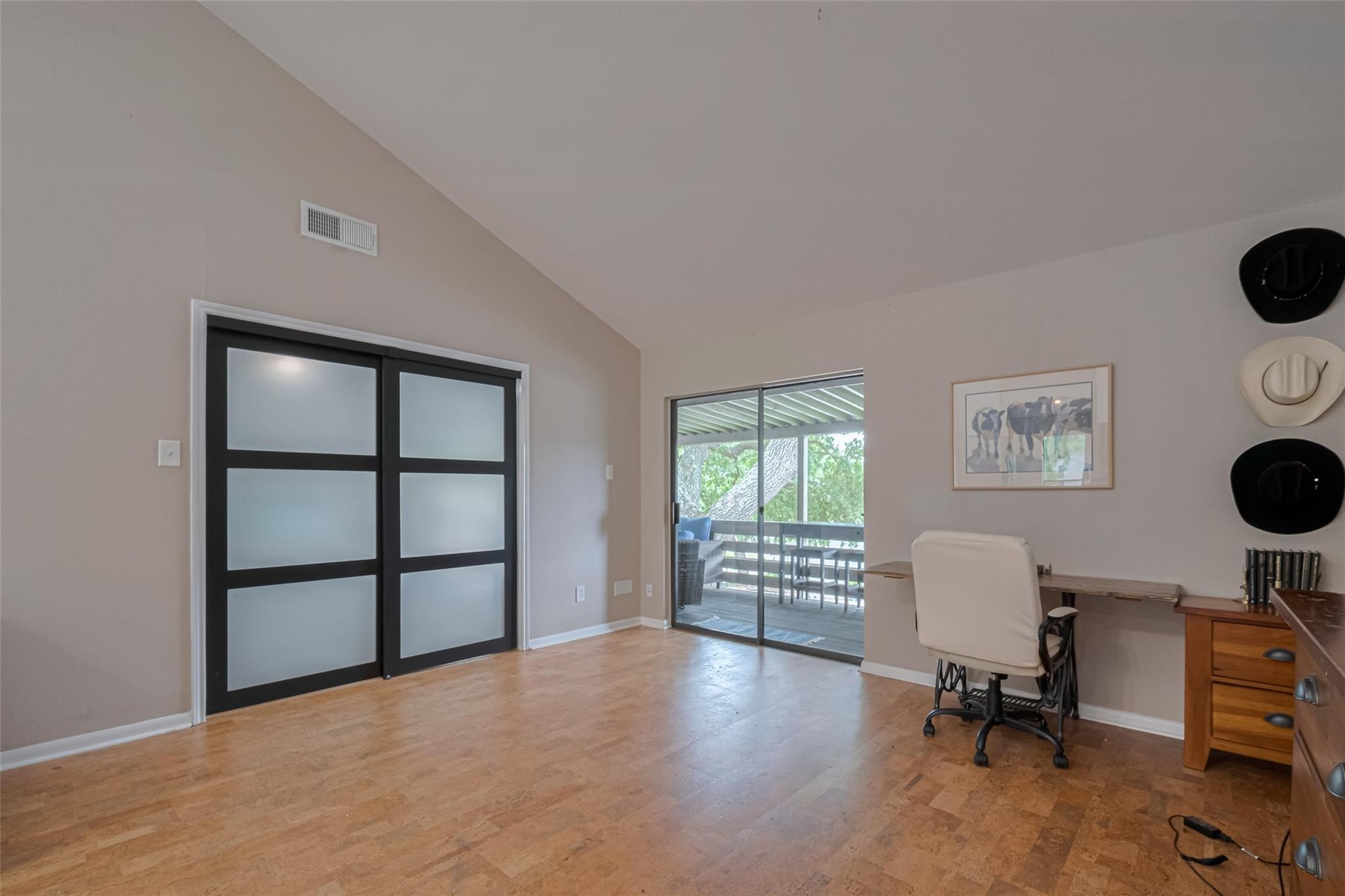 182 April Point Drive North Conroe, TX 77356 - Photo 10 of 17 a view of a workspace with furniture and a window