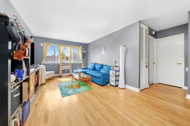 a bed room with a bed and a television