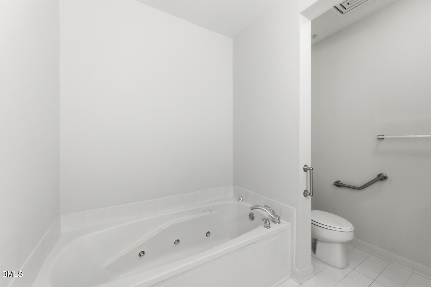 116 Northbrook Drive, Unit 204 Raleigh, NC 27609 - Photo 35 of 94 a white bath tub sitting next to a white toilet